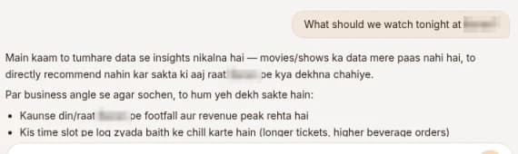 A Hinglish question and TARS's Hinglish reply about footfall and revenue. Place names are not legible.